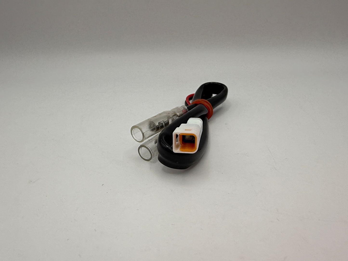 Indicator Connector Wire for Aftermarket Indicators fitted to KTM Models, Wire Length 29cm, 2 female bullet connectors to KTM single block connector with 2 mini male spade connectors.